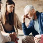 Adults sitting together in a supportive group discussion about ADHD and mental health